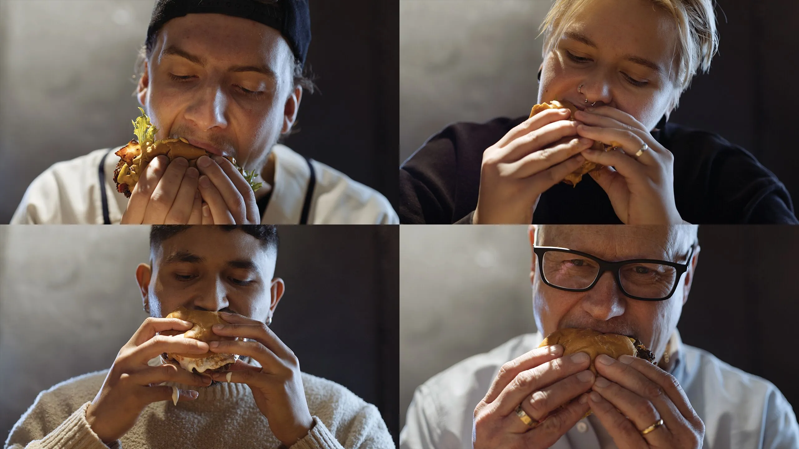 fyra personer som trycker i sig hamburgare